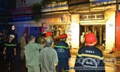 Tạt xăng đốt cửa hàng bạn gái để trả thù tình
