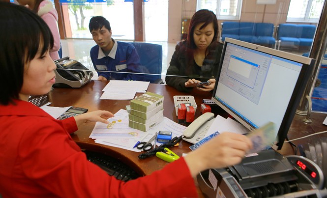 Ngân hàng dẫn đầu thưởng Tết 'khủng' Mặt bằng thưởng Tết ngân hàng năm nay dự kiến nhỉnh hơn năm ngoái. Ảnh: Như Ý.