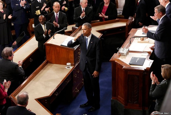 Ảnh thế giới ấn tượng trong tuần Tổng thống Mỹ Barack Obama tuyên bố nước Mỹ đã khoát khỏi cuộc khủng hoảng tài chính và cam kết đưa ra các chính sách kinh tế mới có lợi cho tất cả người Mỹ.