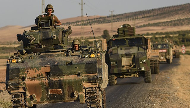 Chính quyền Damascus tố Ankara đánh chiếm lãnh thổ Syria Quân đội Thổ Nhĩ Kỳ tham gia chiến dịch "Lá chắn sông Euphrates". Ảnh: AFP