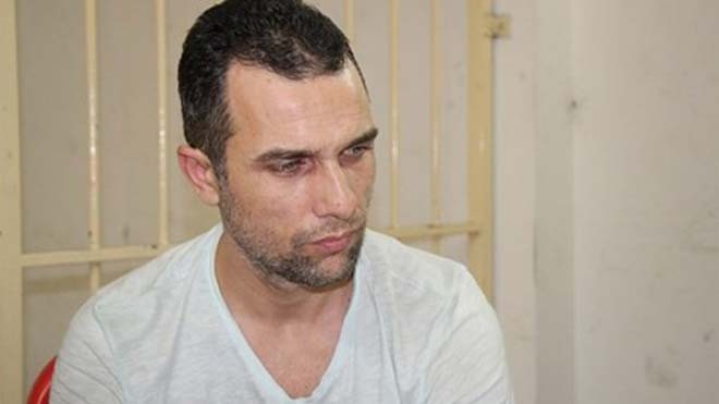 Bắt “quý ông” nước ngoài dùng thẻ ATM giả rút tiền thật Đối tượng Ivan Slavov Rusev bị bắt tại TP HCM. Ảnh: Phùng Bắc