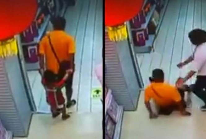 Bé trai tử vong thương tâm vì bị bố ngã đè lên người Khoảnh khắc người bố ngã đè lên con trai được ghi lại bởi camera giám sát.