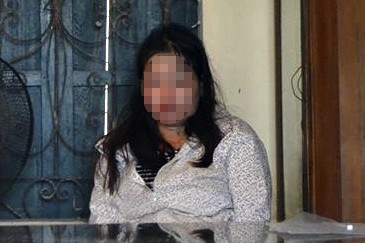 Người phụ nữ bị người dân truy đuổi vì... trộm chó Đối tượng Trần T.L.