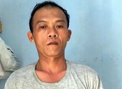 Người phụ nữ bị chồng cũ treo ngược lên xà nhà Tú bị cáo buộc đe dọa giết người. Ảnh: C.A