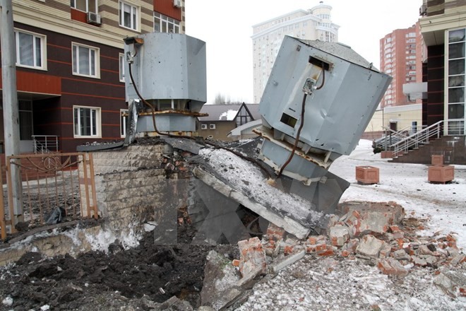 Bản tin 14H: Ukraine bắt đầu tổng động viên quy mô lớn Một căn nhà bị hư hại nghiêm trọng trong cuộc giao tranh ở Donetsk ngày 18/1. Nguồn: AFP/TTXVN