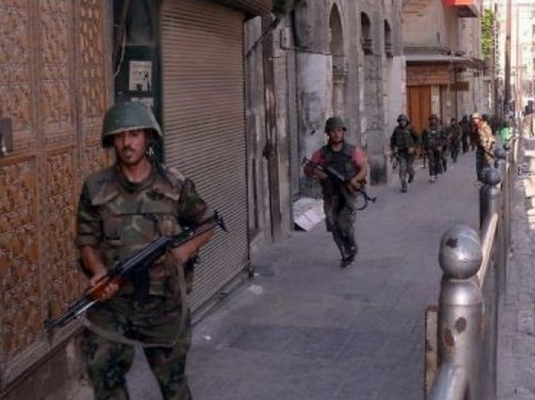 Bản tin 20H: Syria giành lại các nhà máy tại Aleppo từ phiến quân Lực lượng binh sỹ Syria tại Aleppo. (Nguồn: AP)