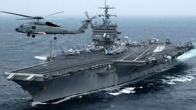 Bản tin 20H: IS kêu gọi tấn công căn cứ quân đội Mỹ tại Bahrain Tàu sân bay Mỹ thuộc biên chế Hạm đội 5 ở Bahrain. (Nguồn; islamicinvitationturkey.com)