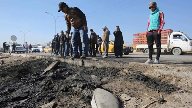 Bản tin 14H: IS tăng cường các hành động khủng bố Hiện trường vụ đánh bom xe ở Iraq. (Nguồn: AP)