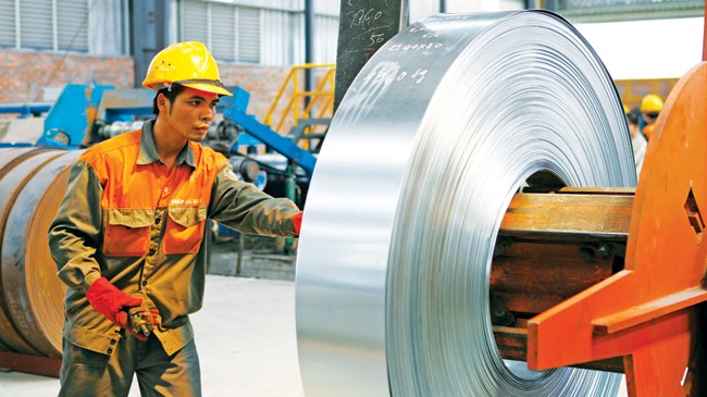 Ông Vương Đình Huệ: Kinh tế 2015 đã sáng rõ hơn - ảnh 1