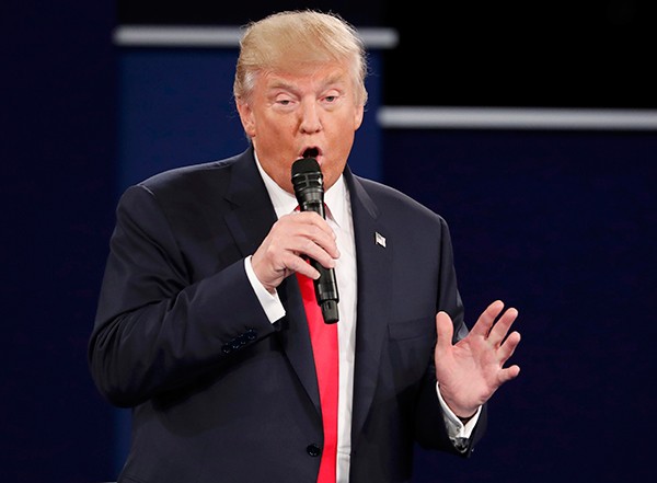 Tỷ phú Trump thừa nhận 'không đóng thuế trong 20 năm' - ảnh 3