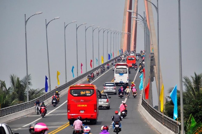 Dân miền Tây ùn ùn trở lại Sài Gòn sau Tết - ảnh 4