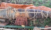 Người dân rốn lũ đi làm trở lại và phát hiện bom 'khủng'