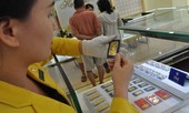 Giá vàng miếng đi xuống, USD tăng