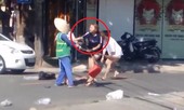 Bị nhắc nhở vứt rác bừa bãi, chủ shop quần áo đánh cô lao công tới tấp