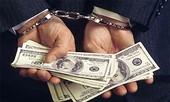 Nguyên hiệu trưởng đặt gói quà chứa 20 triệu ở nhà điều tra viên