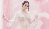 Á hậu Hoàng Anh mặc váy xuyên thấu khoe bụng bầu 8 tháng