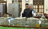 Truy tố 12 bị can mua bán trái phép gần 500 bánh heroin