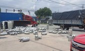Xe chở hơn 100 bình gas lật trước cây xăng, người dân tháo chạy toán loạn