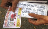 Người đàn ông được chia đôi vé số độc đắc trúng khi đi nhậu