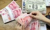 Nhân dân tệ liên tục trượt giá, vàng, USD chững lại