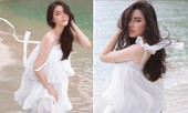 Lý Nhã Kỳ diện váy trắng mỏng manh khoe dáng quyến rũ trước biển
