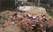Khởi tố chủ nợ đào mộ mẹ vợ của người vay tiền