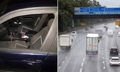 Nhoài người ra cửa sổ ô tô để quay clip đăng lên mạng, cô gái lộn nhào xuống đường cao tốc