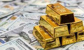 Giá vàng loạn nhịp, USD đứng im