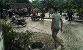 Phát hiện thi thể con trai dưới ao sau khi nhà bị phóng hỏa