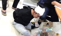 Tên cướp 700 triệu đồng trong ngân hàng đã nổ súng hòng tẩu thoát