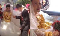 Cô dâu ở Trung Quốc đeo 30kg vàng nhà chồng tặng trong ngày cưới khiến netizen tranh cãi