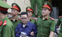 Cựu tổng giám đốc Quỹ Lộc Việt tại phiên tòa. Ảnh: Tân Châu