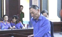 Cựu Tổng giám đốc Cty tài chính cao su Việt Nam Phan Minh Anh Ngọc tại tòa ngày 20/11. Ảnh: Tân Châu