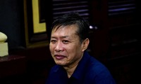 Cựu trung tá Nguyễn Hồng Ánh tại phiên tòa hôm nay 27/11. Ảnh: Tân Châu