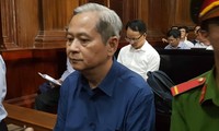 Nguyên Phó Chủ tịch UBND TPHCM - bị cáo Nguyễn Hữu Tín tại phiên tòa. Ảnh: Tân Châu
