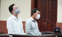 Ông Lâm Hoàng Tùng và Nguyễn Hải Nam tại phiên tòa phúc thẩm.