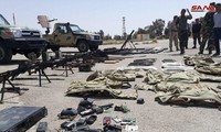 Chiến binh Hồi giáo xin hàng, giao nộp vũ khí cho quân đội Syria