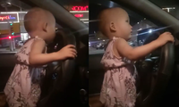 Thót tim nhìn em bé 2 tuổi cầm vô lăng điều khiển ô tô chạy trên quốc lộ