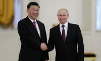 Tổng thống Nga Vladimir Putin và Chủ tịch Trung Quốc Tập Cận Bình tại cuộc gặp ngày 5/6 ở Mátxcơva. (Ảnh: Xinhua)