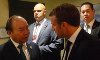 Chủ tịch nước Nguyễn Xuân Phúc trong một dịp gặp Tổng thống Pháp Emmanuel Macron. (Ảnh: VNA)