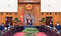 Thủ tướng Phạm Minh Chính trong cuộc tiếp Đại sứ Rumania. (Ảnh: Mofa)