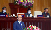 Chủ tịch nước Nguyễn Xuân Phúc phát biểu trước Quốc hội Lào sáng 10/8. (Ảnh: TTXVN)