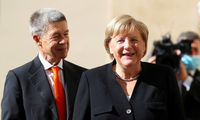 Thủ tướng Đức Angela Merkel và Phu quân. (Ảnh: Reuters)