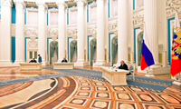 Tổng thống Nga Vladimir Putin dự lễ ký các thoả thuận với 2 vùng ly khai của Ukraine. (Ảnh: Reuters)