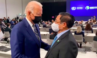 Thủ tướng Phạm Minh Chính trong cuộc gặp Tổng thống Mỹ Joe Biden bên lề hội nghị khí hậu tại Anh vào tháng 11/2021. (Ảnh: TTXVN)