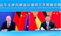 Chủ tịch Trung Quốc Tập Cận Bình và Thủ tướng Đức Olaf Scholz có cuộc hội đàm trực tuyến ngày 9/5. (Ảnh: Xinhua)