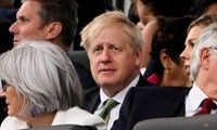 Thủ tướng Anh Boris Johnson và phu nhân dự sự kiện kỷ niệm 70 năm trị vị của Nữ hoàng Elizabeth ngày 4/6. (Ảnh: Reuters)