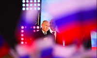 Tổng thống Nga Vladimir Putin dự một sự kiện chào mừng việc sáp nhập 4 tỉnh của Ukraine. (Ảnh: Reuters)