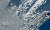 Hình ảnh đập Nova Kakhovka vỡ chụp từ vệ tinh. (Ảnh: AP)