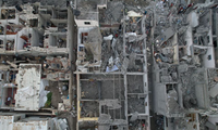 Những toà nhà ở Dải Gaza bị tàn phá vì bom của Israel. (Ảnh: Reuters)